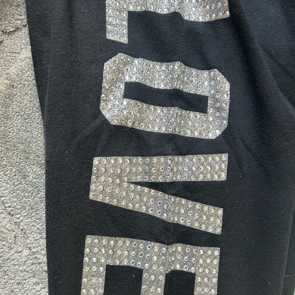 love pink rhinestone pants size xs ( all the bling is there but there is crackin